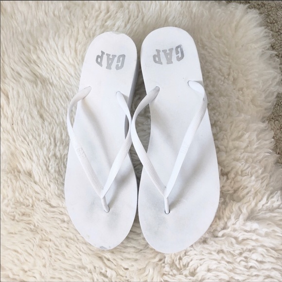 white foam flip flops